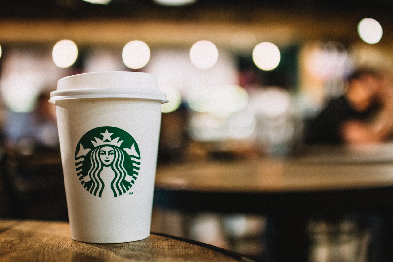 A Starbucks disposable coffee cup